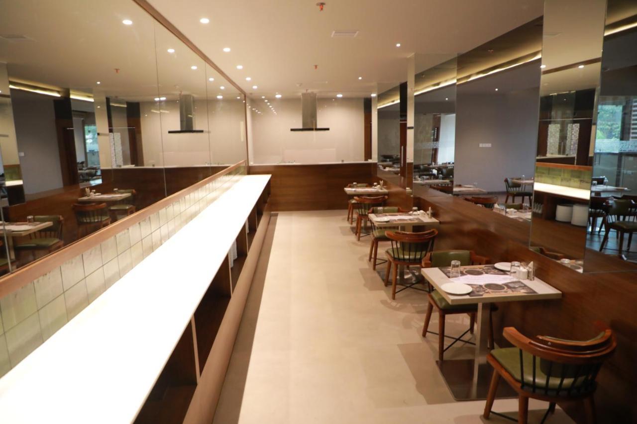 Magnet Hotel Kannur ภายนอก รูปภาพ